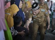 668 KPM Kota Metro Terima Bantuan Buku Tabungan PKH